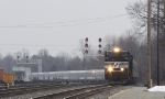 NS 2704 leads the RBBB circus train past the signals at Pomona